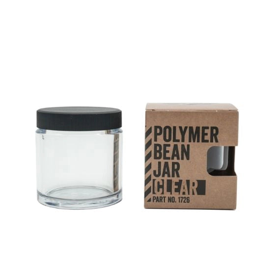 Clear Polymer Comandante Coffee Bean jar with black lid and cardboard box labeled 'Polymer Bean Jar Clear' on a white background