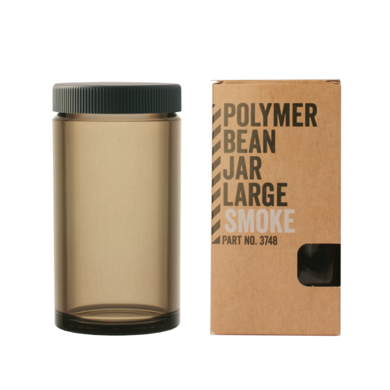 Brown Comandante Smoke polymer bean jar with black lid and matching cardboard box on a white background
