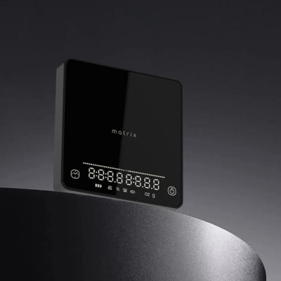 Black digital display with 'matrix' branding on a dark background Basic Barista Coffee Gear