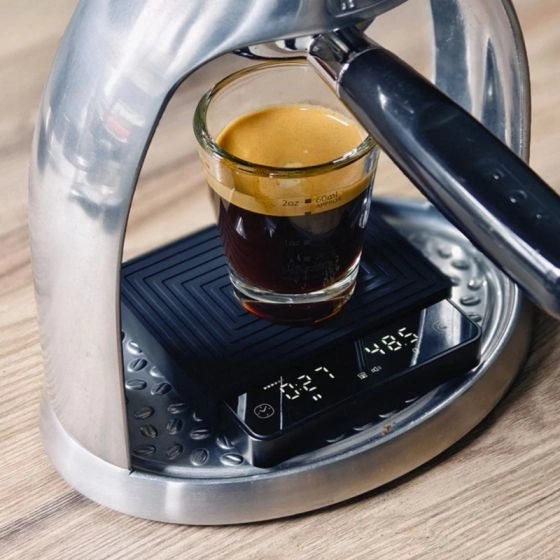 Manual espresso Machine pouring Coffee onto Matrix G1 Black Espresso Scales Basic Barista Coffee Gear