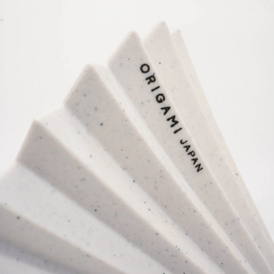 Origami Rework Dripper Recycled Origami Drippers into Rework new pour over coffee dripper Basic Barista Origami Japan 'ORIGAMI JAPAN' Logo close up on a white background