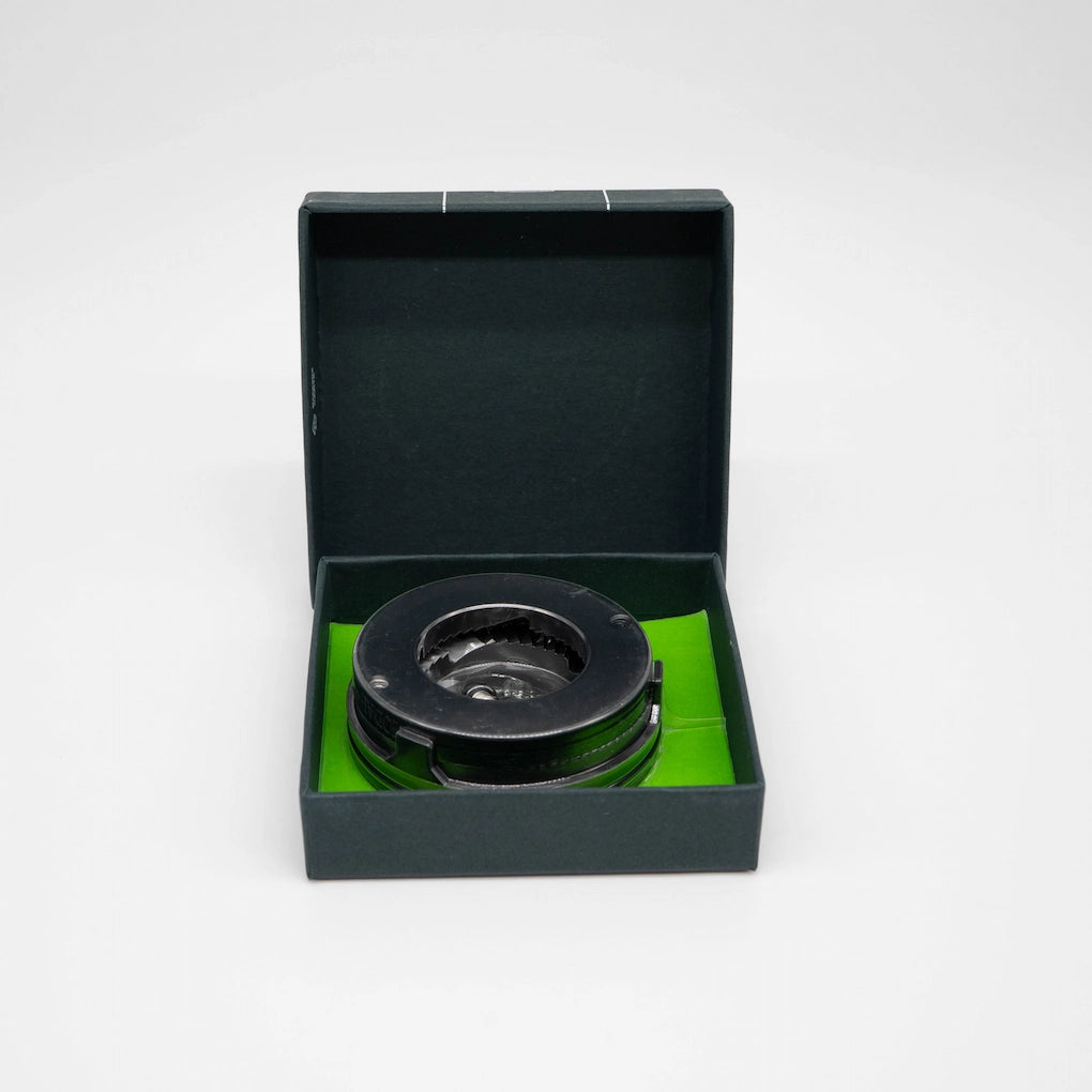Pietro M Modal Replacement Coffee Burrs in dark green packaging box on white background Basic Barista Coffee Gear