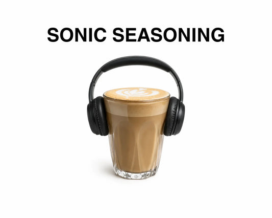 Sonic Seasoning - How Music Can Change The Taste Of Your Coffee Basic Barista Espresso in glass holding on white background 