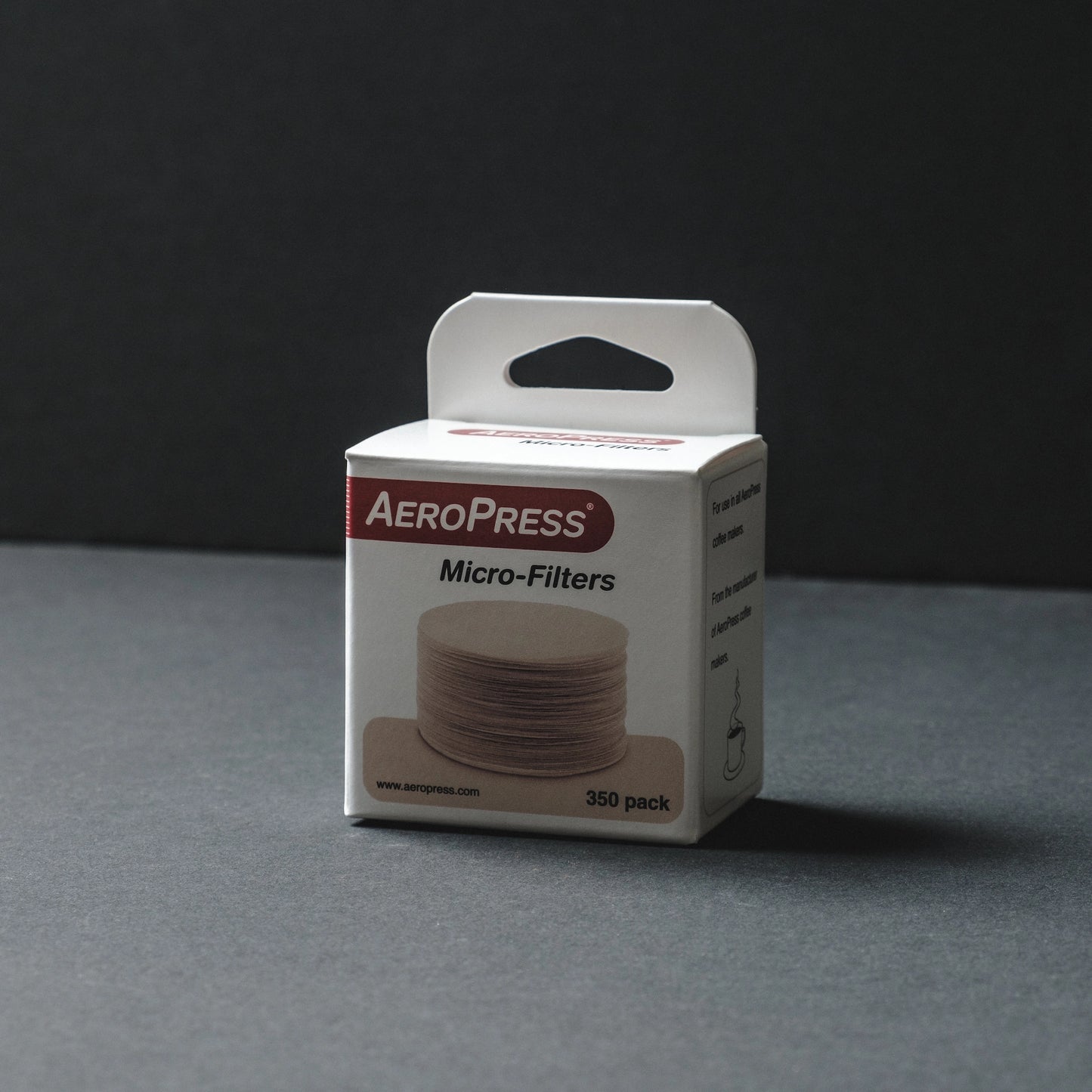 Aeropress micro filters white packaging on a dark background Basic Barista AeroPress Coffee Filters