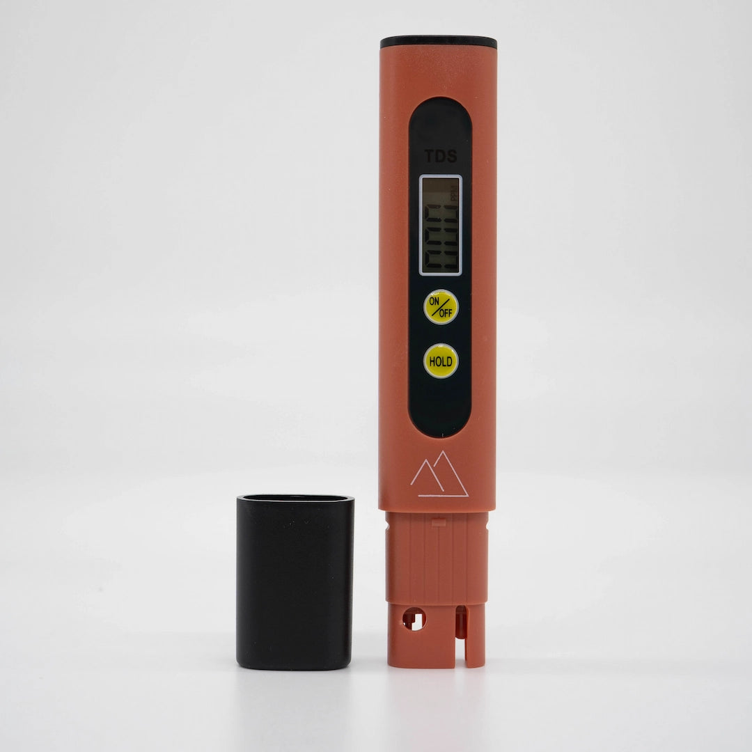 Red digital TDS meter Pen with black case on a white background Apax lab water meter pen