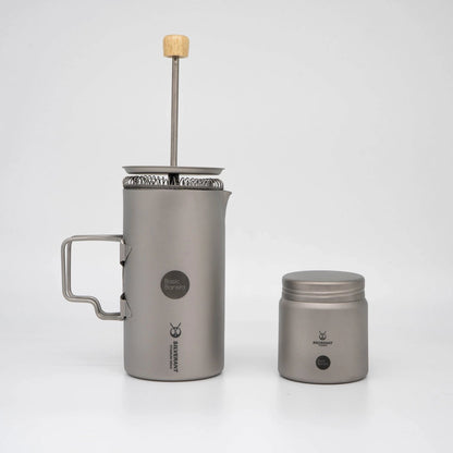Grey Titanium coffee press with wooden handle and Basic Barista Coffee Bean Storage Container on a white background  Basic Barista Coffee Gear