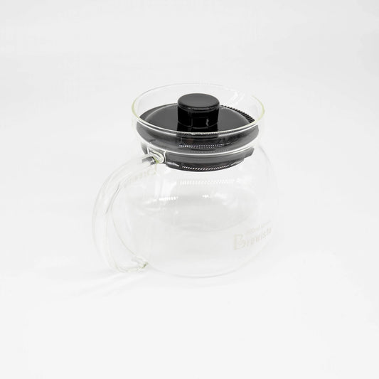 A 600ml glass coffee server carafe by Brewista, featuring a clear glass body, a black lid, and a clear glass handle, shown on a white background.