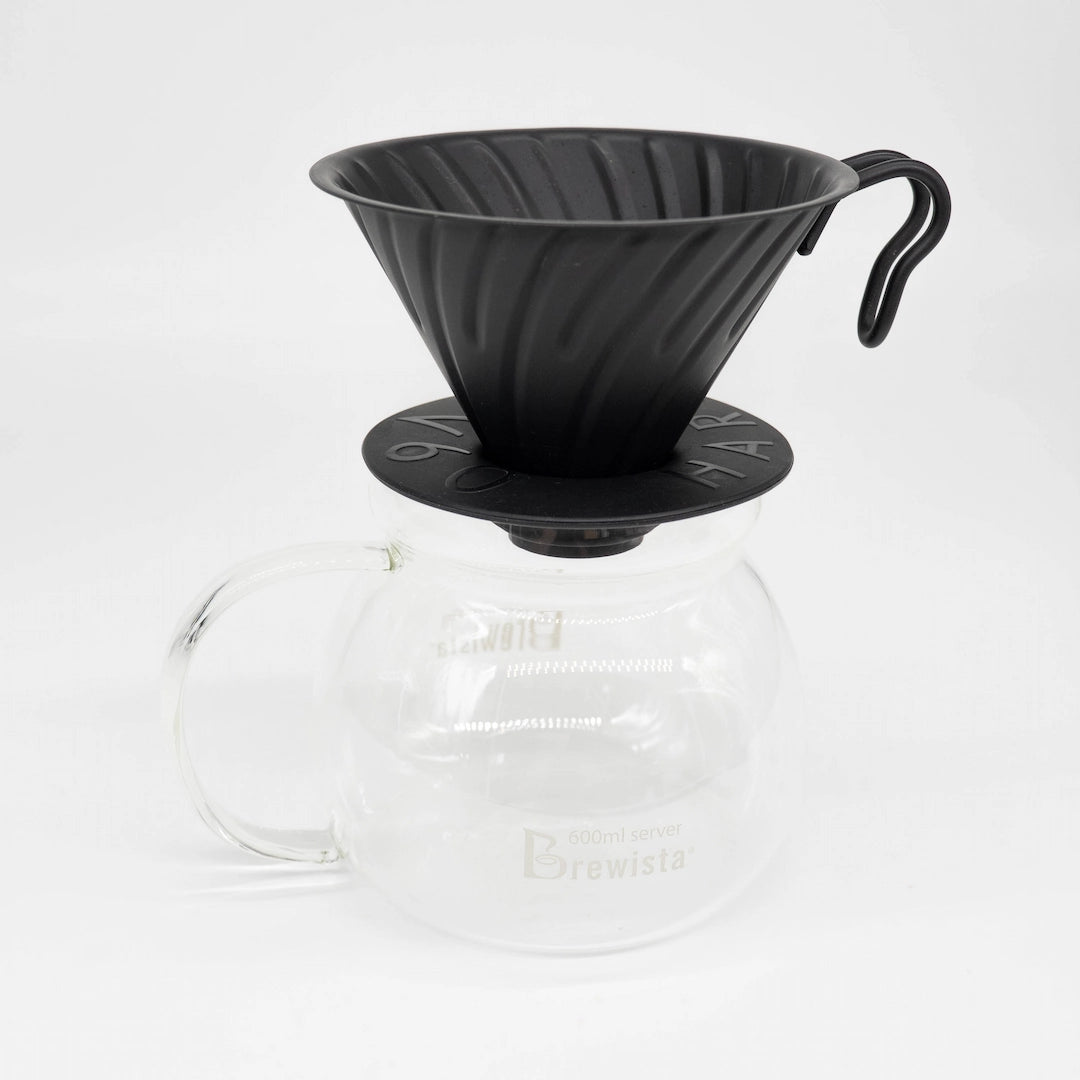 A 600ml glass coffee server carafe by Brewista, featuring a clear glass body, a black lid, and a clear glass handle, shown on a white background.