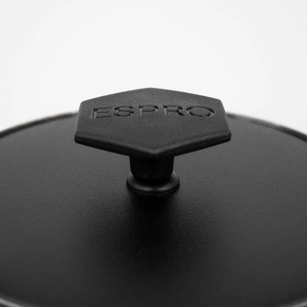 Close up of a black stainless steel matte black coated french press P6 lid on a light grey background Basic Barista Matte Black Online Coffee Gear 