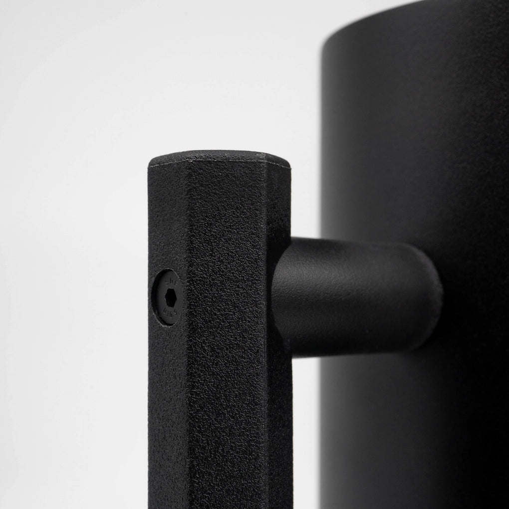 Close up of a black stainless steel matte black coated french press Handle and lid on a light grey background Basic Barista Matte Black Design Coffee Gear Online 