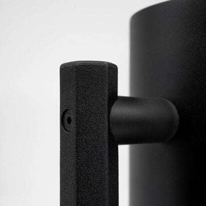 Close up of a black stainless steel matte black coated french press Handle and lid on a light grey background Basic Barista Matte Black Design Coffee Gear Online 