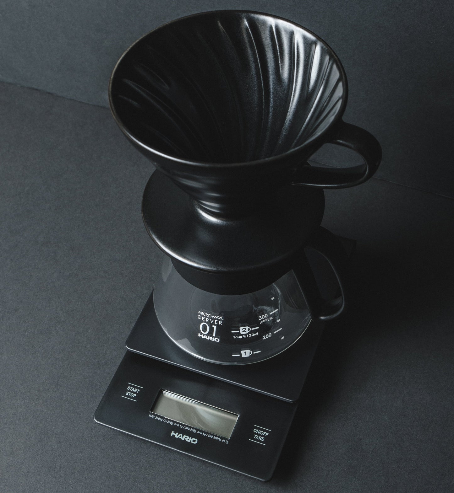 Hario V60 Ceramic Dripper Matte Black Pour over coffee dripper on coffee scales