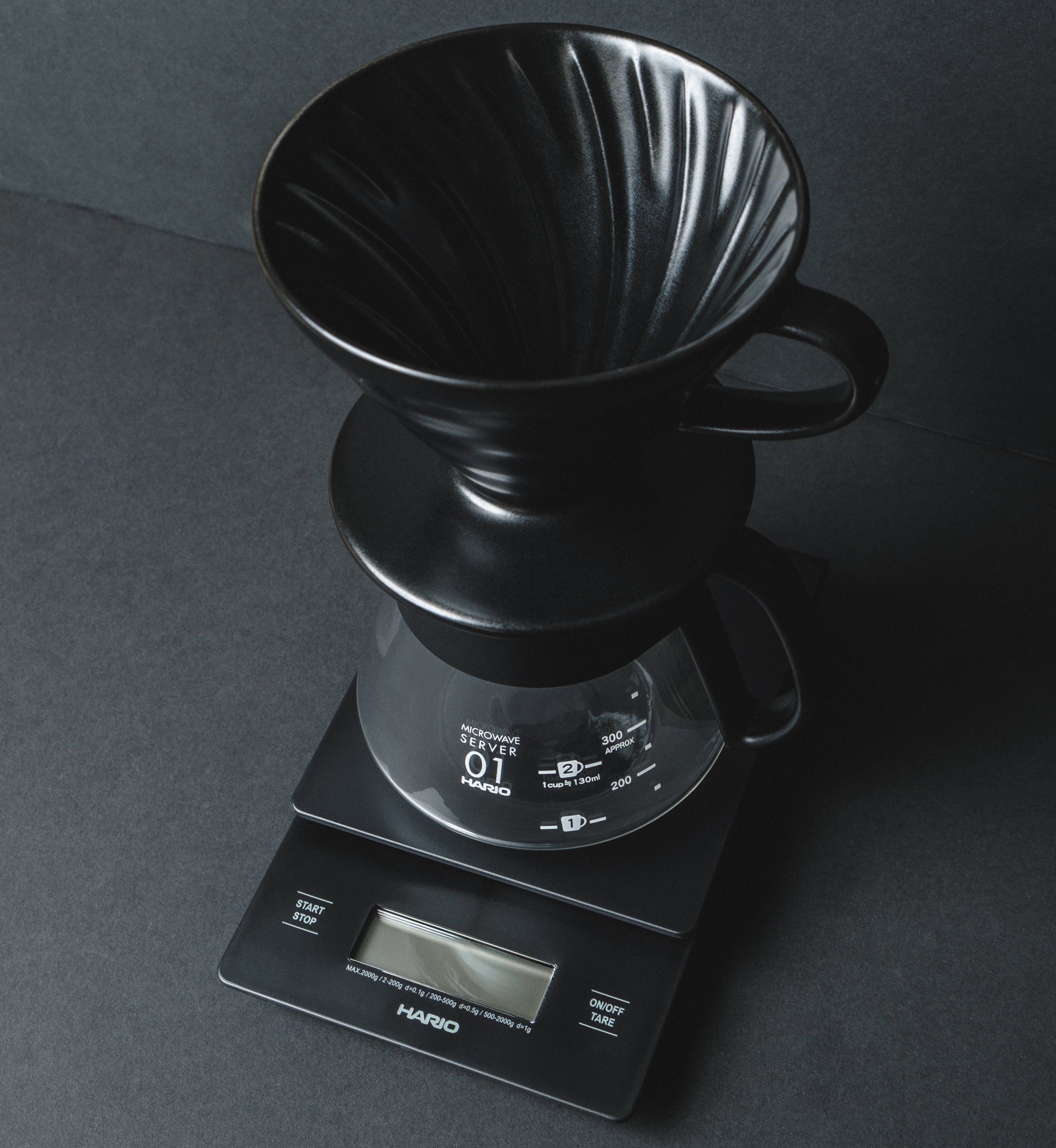 Hario V60 Ceramic Dripper Matte Black Pour over coffee dripper on coffee scales