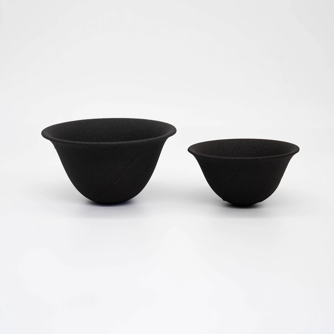 Two black ceramic filter / dripper small size and large size - on a white background