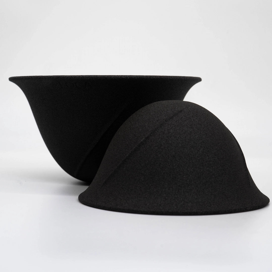 Two black ceramic filter / dripper small size and large size - on a white background - round coffee cups