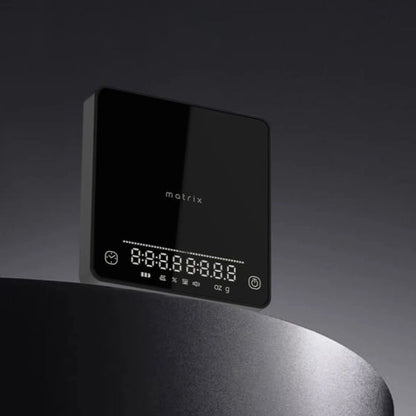 Black digital display with 'matrix' branding on a dark background Basic Barista Coffee Gear