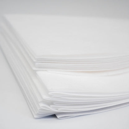 New Generation Filter Paper 100pk Perme Filter Basic Barista Permeable Filter Paper Coffee Brewing Filter Close up folded paper stacked White background