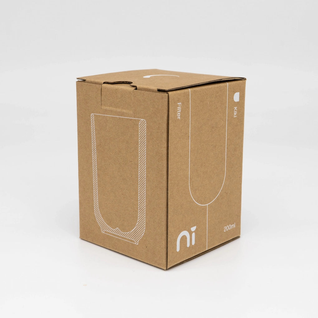 Ni Wares Kiki Cup Ceramic Coffee Cup retail box on grey background 