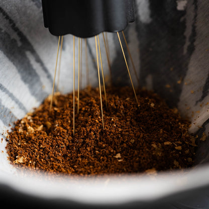 close-up macro photography by Basic Barista of Nucleus Bloom WDT Needle Tool for Pour Over Coffee Black pen