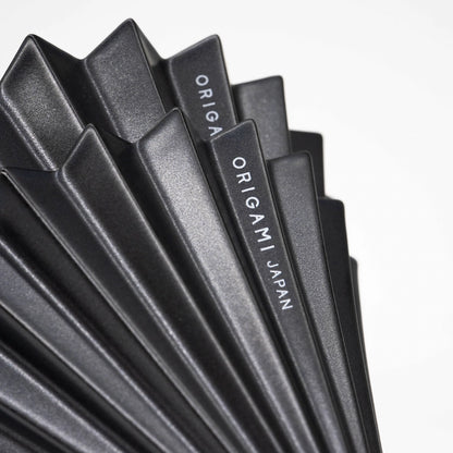 Matte Black Origami Dripper Limited edition coffee brewer Basic Barista Coffee Brewer cone on white background close up of 'ORIGAMI Japan' logo
