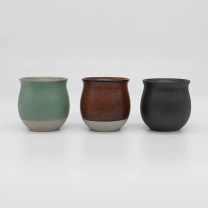 Three Origami Pinot ceramic cups in green, red, and black on a white background - Basic Barista coffee gear coffee cups