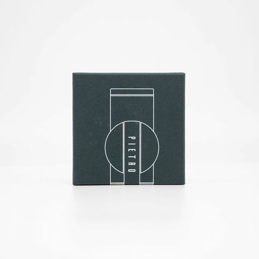 Pietro M Modal Replacement Coffee Burrs in dark green packaging box on white background Basic Barista Coffee Gear