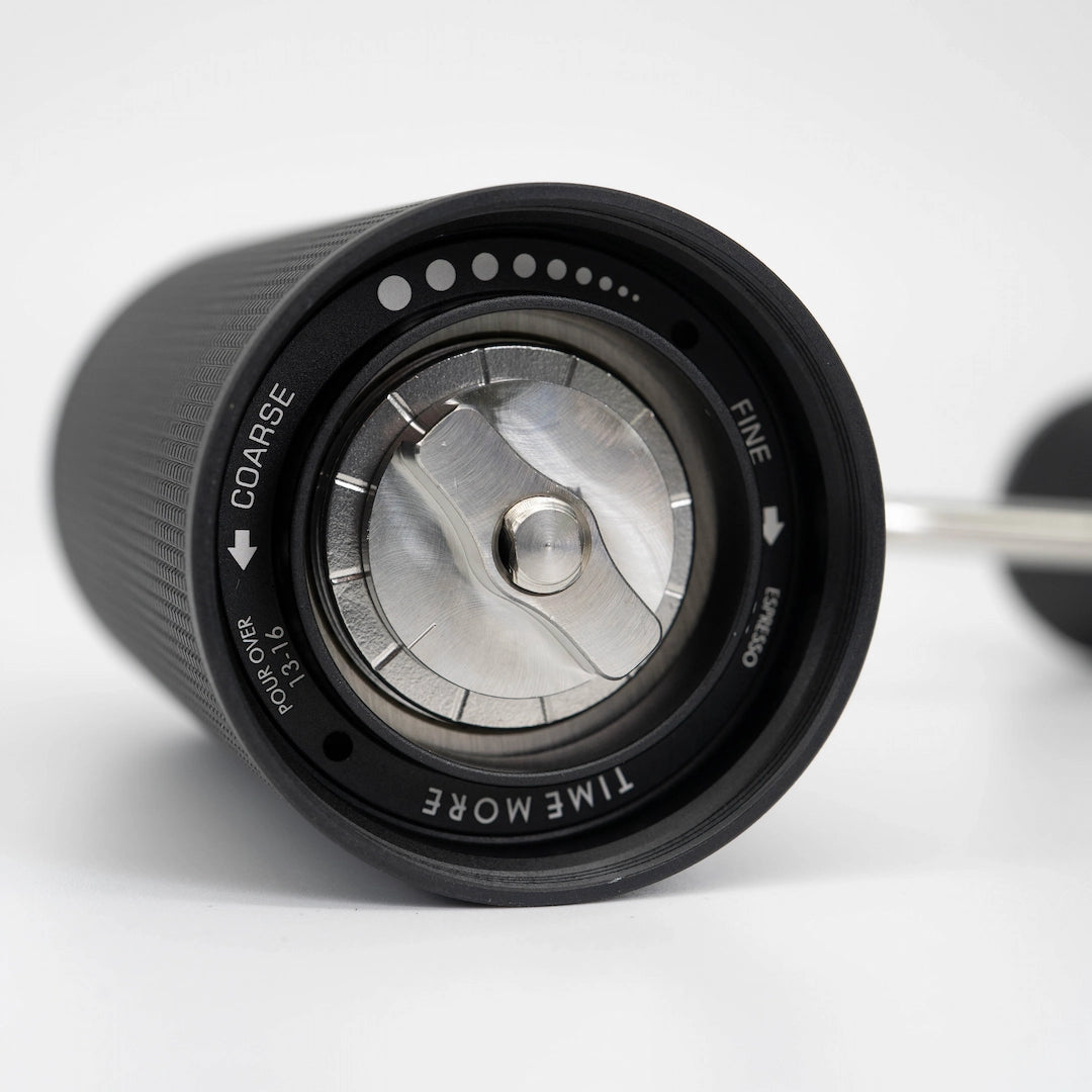 Closeup of Timemore Chestnut C3S Coffee Hand Grinder - Black Coffee Grinder grind size dial on White Background Basic Barista Coffee Grinders