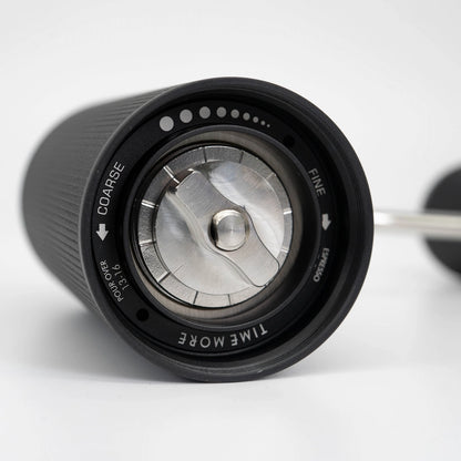 Closeup of Timemore Chestnut C3S Coffee Hand Grinder - Black Coffee Grinder grind size dial on White Background Basic Barista Coffee Grinders