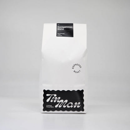 Coffee package labeled 'Backgammon Blend' by Tin Man Coffee Roasters on a gray background Backgammon Blend Roasted Coffee Beans Basic Barista 1kg bag paper coffee bag
