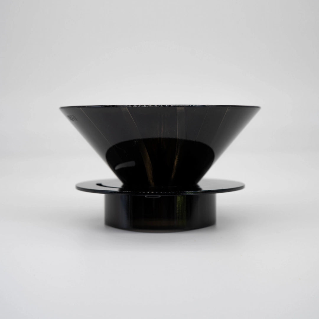 Black plastic UFO Dripper on a white background Basic Barista Pour Over Coffee Gear Side on