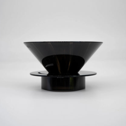 Black plastic UFO Dripper on a white background Basic Barista Pour Over Coffee Gear Side on