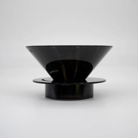 Black plastic UFO Dripper on a white background Basic Barista Pour Over Coffee Gear Side on