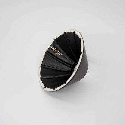 Black and white UFO Dripper Ceramic Matte Black on a White background