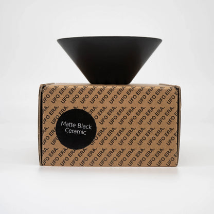 UFO Dripper Ceramic Matte Black Pour Over Coffee Dripper on Brown Box side view on white background Basic Barista Coffee Gear Online