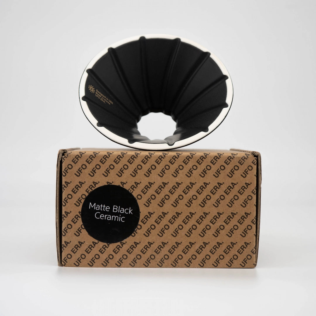 UFO Dripper Ceramic Matte Black Pour Over Coffee Dripper on Brown Box front view on white background Basic Barista Coffee Gear Online