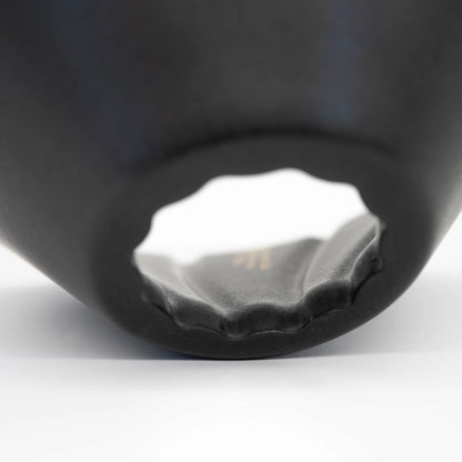 Black and white UFO Dripper Ceramic Matte Black on a White background Close up of dripper hole 80º