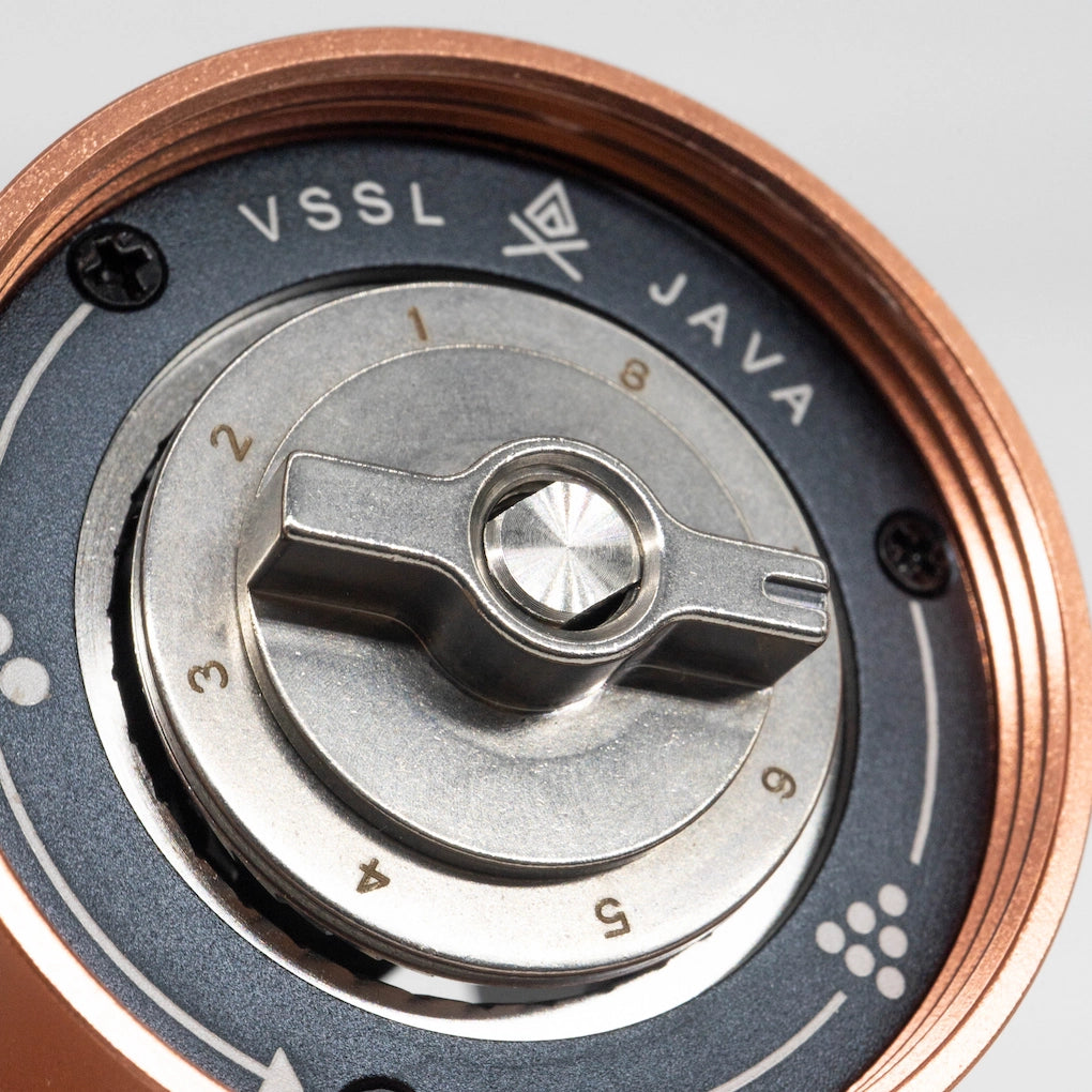 Close up of Burr adjustment and grind size dial on a white background | VSSL Java Grinder Basic Barista Portable coffee Grinders