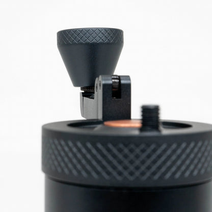 Close up of black travel coffee grinder handle and crank on a white background | VSSL Java Grinder Basic Barista Portable coffee Grinders