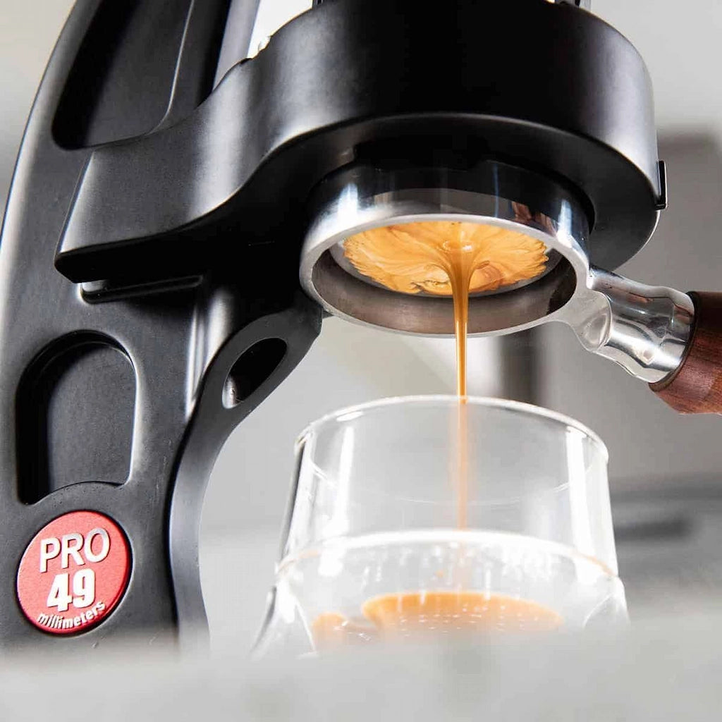 Flair 49 Pro Black manual lever espresso machine with wooden handle on a white background Basic Barista Espresso Shot