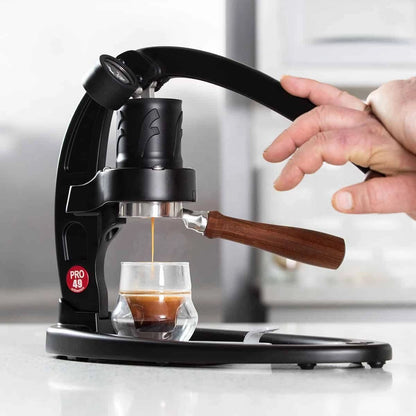 Flair 49 Pro Black manual lever espresso machine with wooden handle on a white background Basic Barista Espresso Shot
